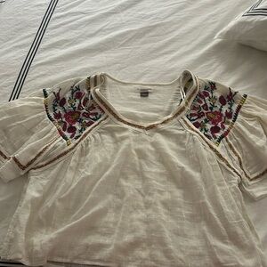 Embroidered Anthropologie top. Embroidery details on the front and the back!